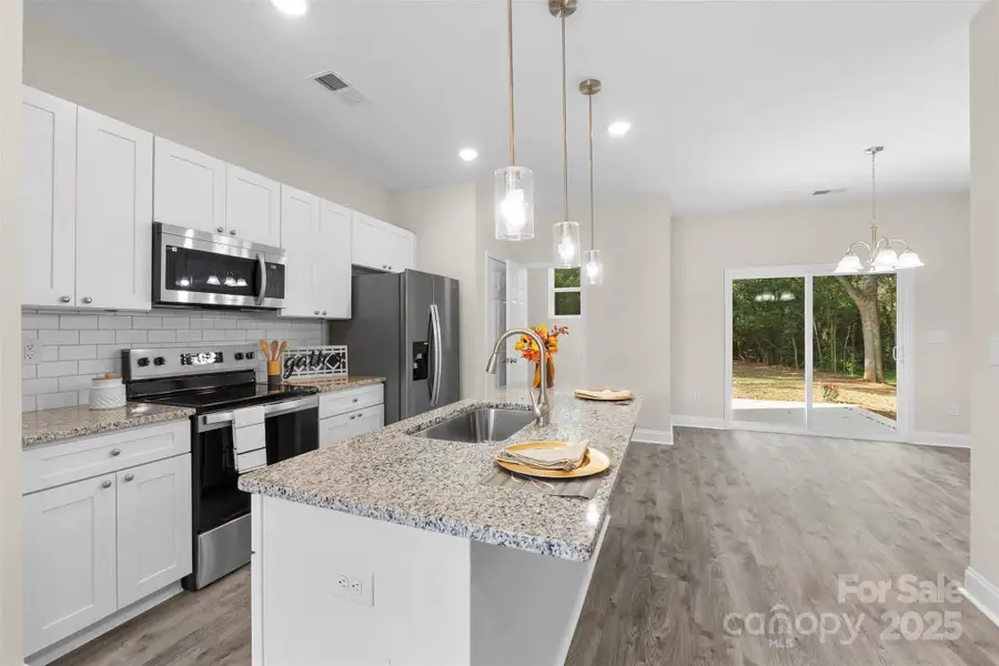 Furnished interior view inside a new home in , Spencer (Image 1).