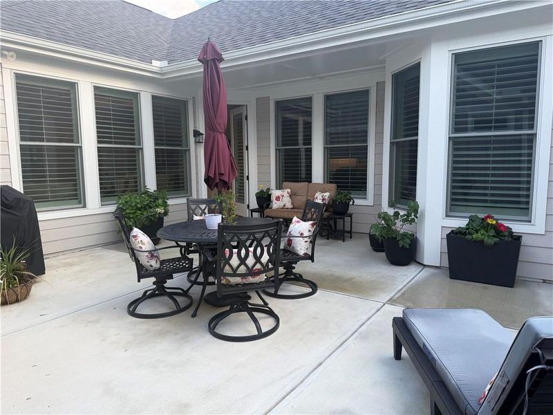 Exterior details and patio area of a home in The Courtyards at Bailey Farms, Dacula (Image 30). Exterior details and patio area of a home in The Courtyards at Bailey Farms, Dacula (Image 30).
