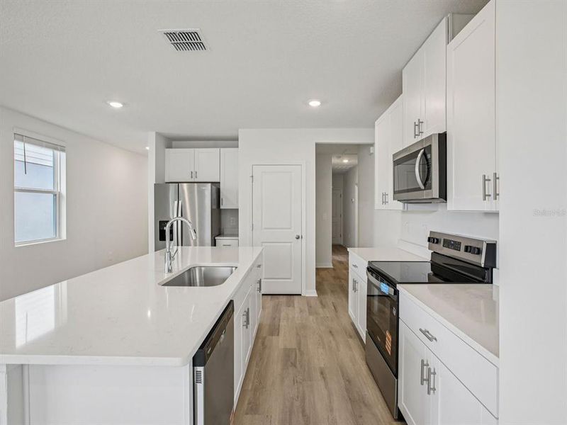 Furnished interior view inside a new home in Salt Meadows - Premier Series, Parrish (Image 6).