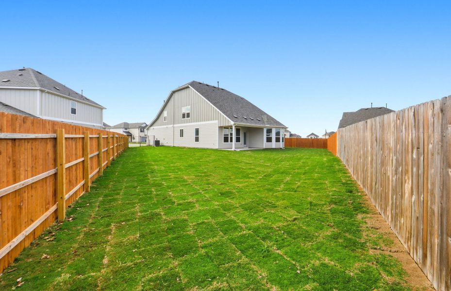 Exterior details and patio area of a home in Santa Rita Ranch, Liberty Hill (Image 27).
