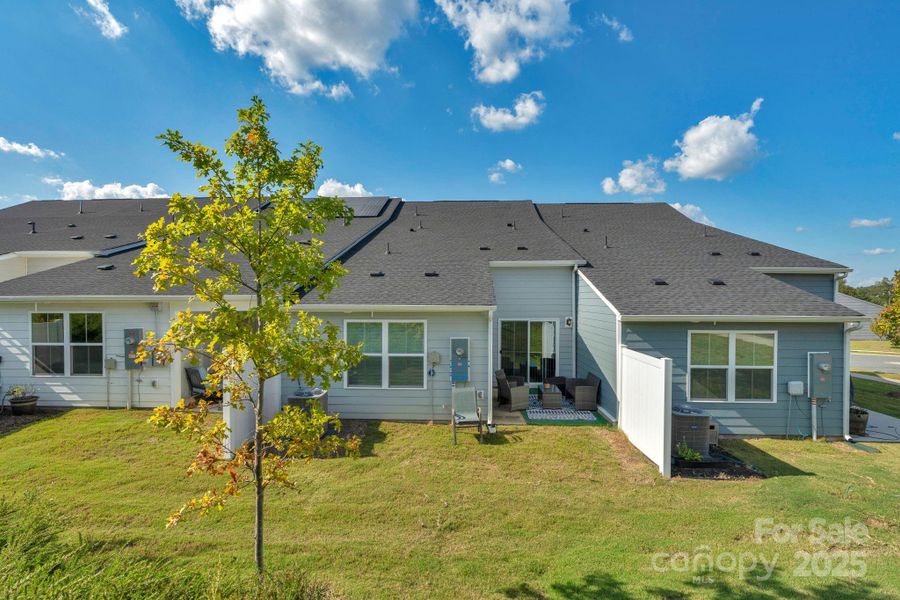 Front exterior of a new home in , Troutman, NC, highlighting curb appeal (Image 25).