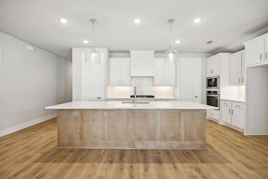 Furnished interior view inside a new home in Painted Tree - Woodland West, McKinney (Image 6).
