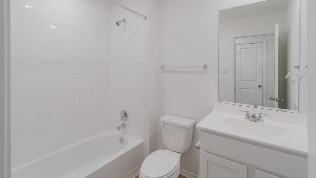 Furnished interior view inside a new home in Valverde, Bastrop (Image 6).