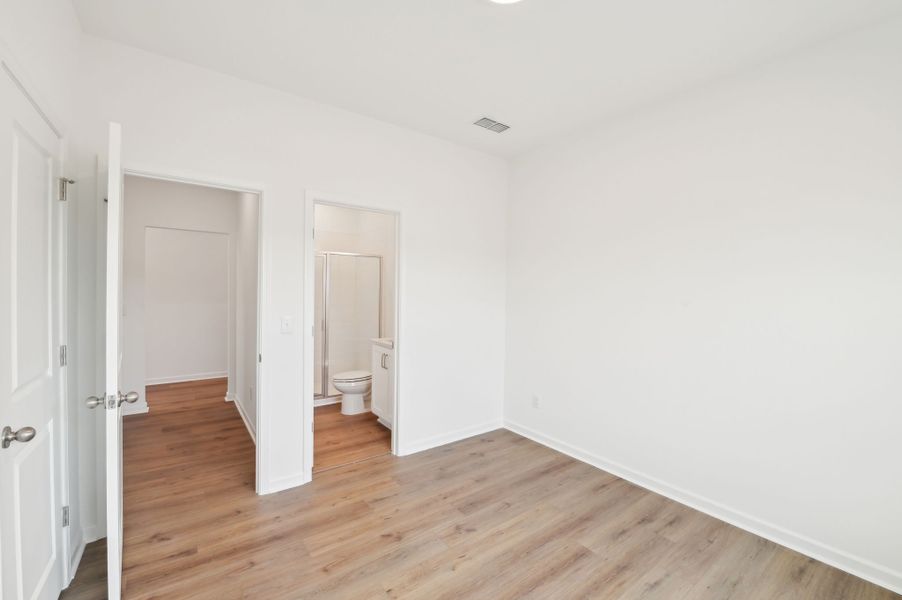 Representative unfurnished interior of a home built from the Alexis by Ashton Woods in Rowland's Grant, Fuquay Varina (Image 31).
