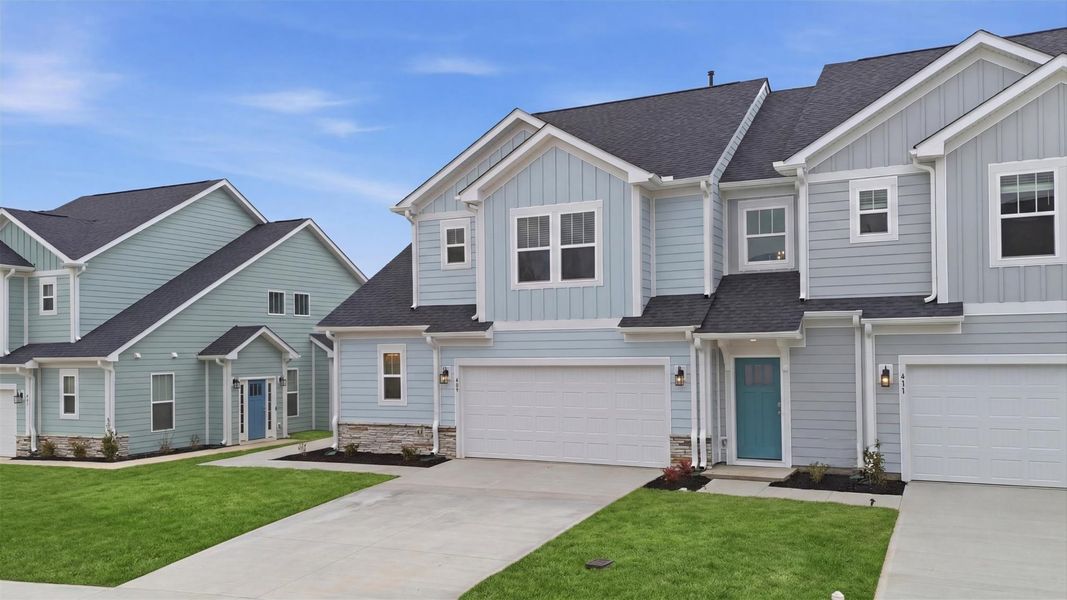 Front exterior of a new home in Village at Midway, Anderson, SC, highlighting curb appeal (Image 20).