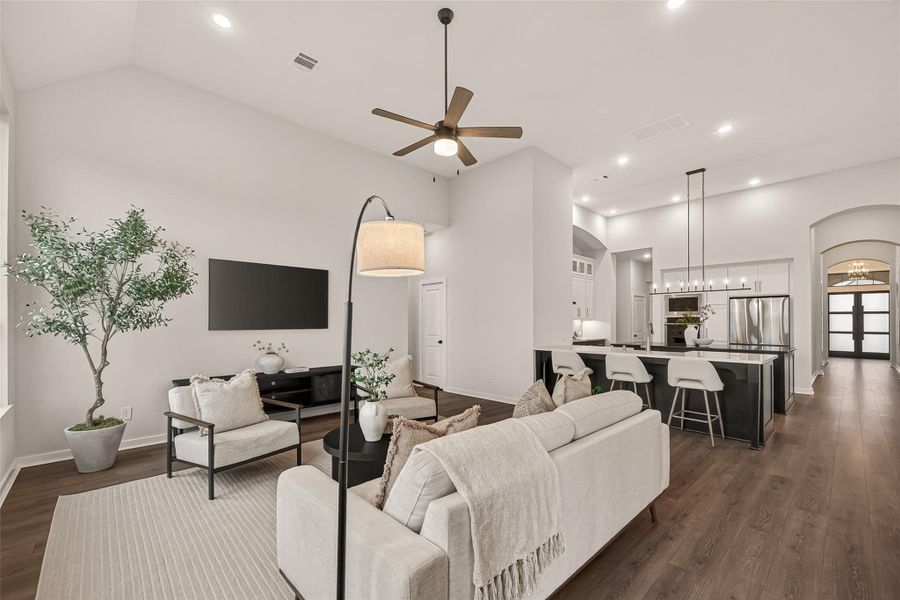 Family room open to the kitchen.  Notice the **Frame TV** on the wall?  it stays with the house!!