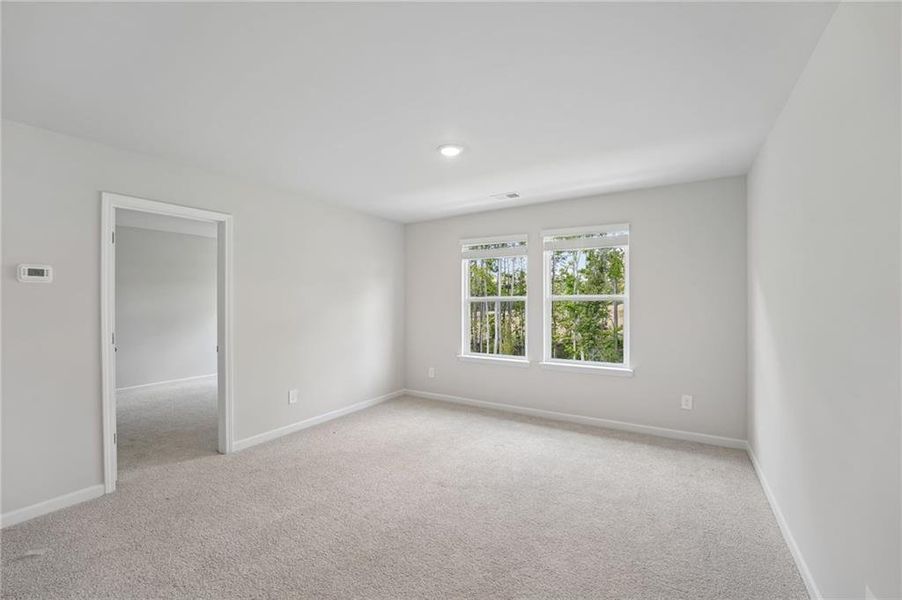 Spacious, unfurnished interior of a new home in Northwoods at Mirror Lake, Villa Rica (Image 24).