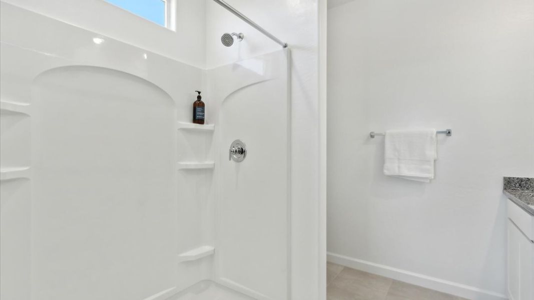 Representative unfurnished interior of a home built from the Cardinal by D.R. Horton in Sorrento, Maricopa (Image 19).