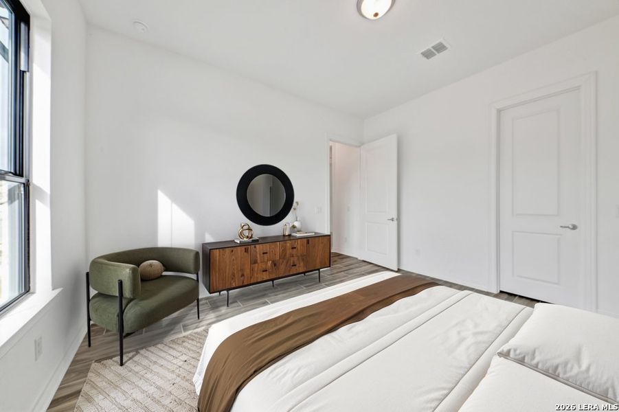 Furnished interior view inside a new home in El Sonido at Campanas, San Antonio (Image 12).