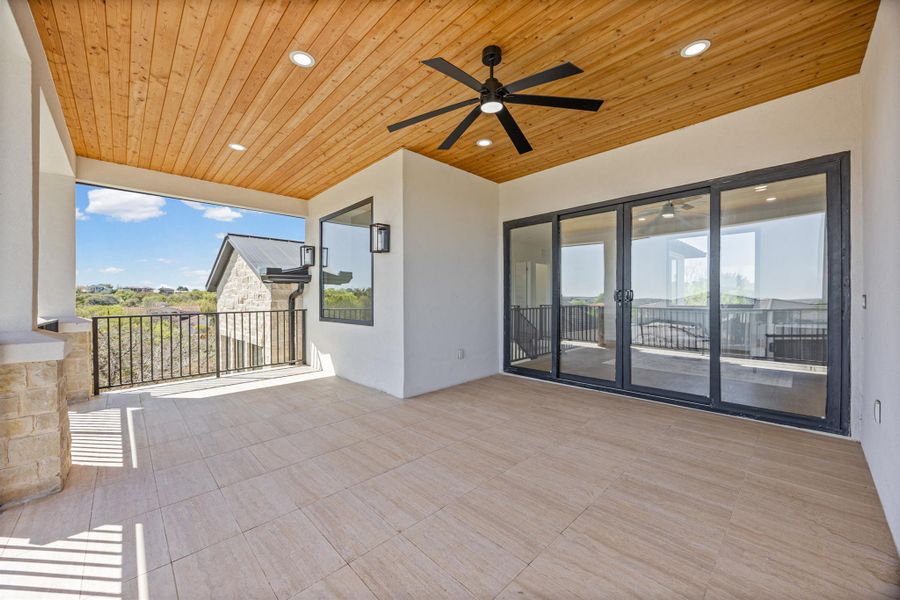 View of patio featuring a ceiling fan
