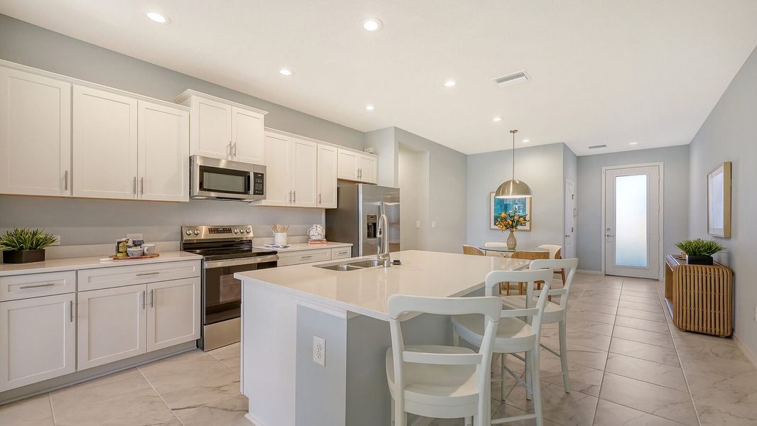 Representative furnished interior of a home built from the Avery by Neal Communities in Grand Park, Sarasota (Image 13).
