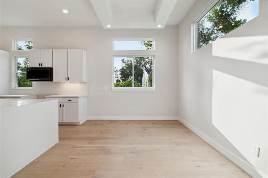 A breathtaking view as you enter the second floor as an abundance of natural light with an array of windows give way to serene aesthetics that surround your dining area.