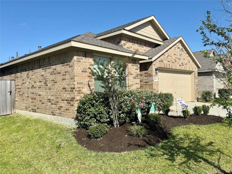 Exterior details and patio area of a home in Sterling Point at Baytown Crossings: Watermill Collection, Baytown (Image 3).