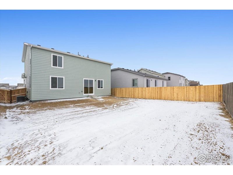 Exterior details and patio area of a home in The Overlook at Johnstown Farms, Johnstown (Image 3).