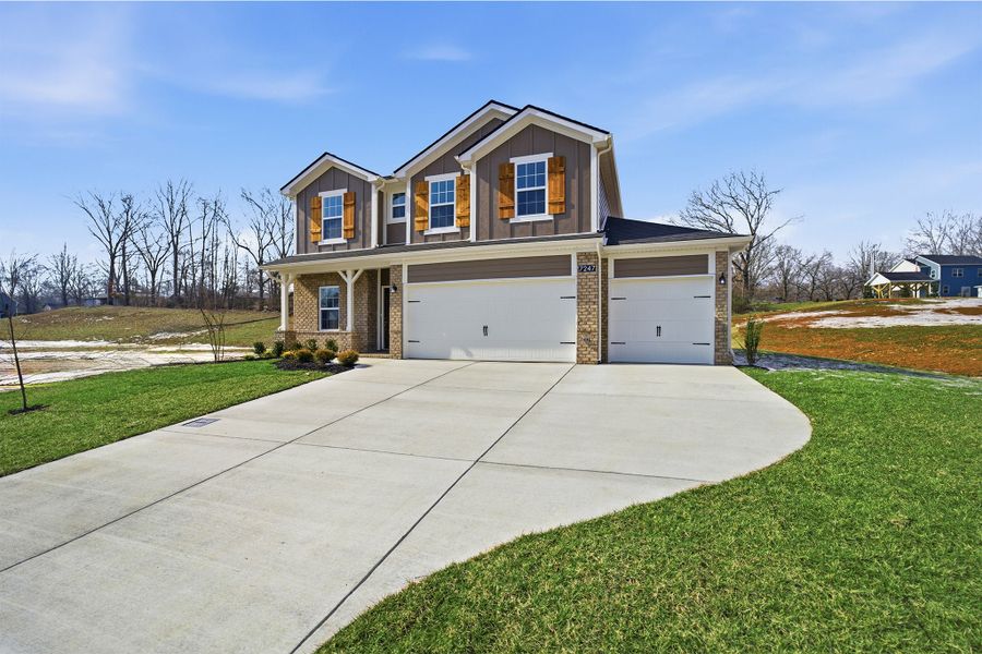 Front exterior of a new home in Brush Creek, Fairview, TN, highlighting curb appeal (Image 2).