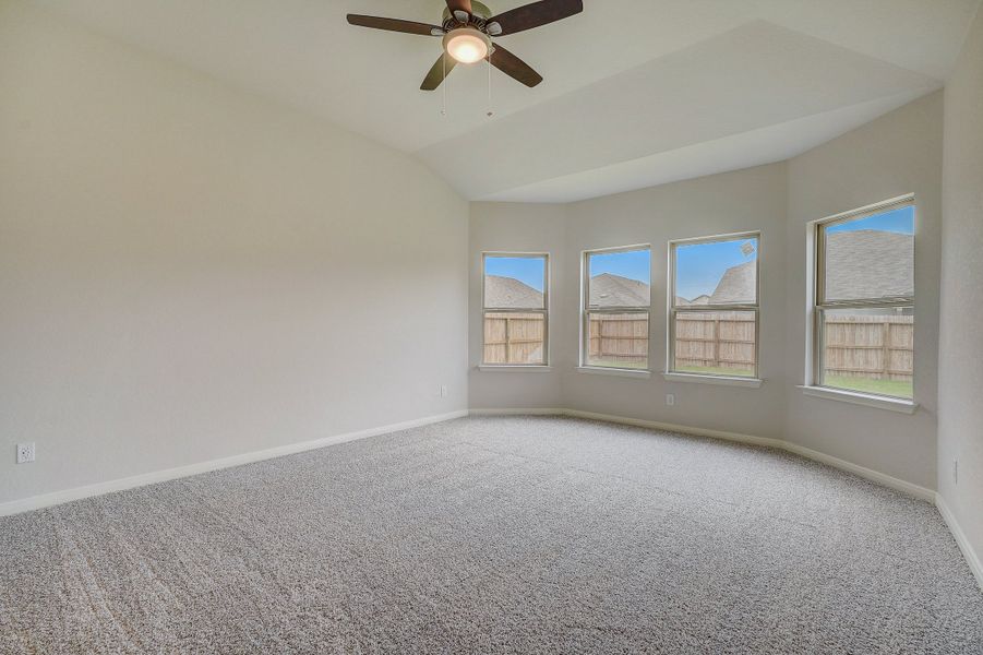 Primary suite bedroom in the Pearl floorplan at a Meritage Homes community.