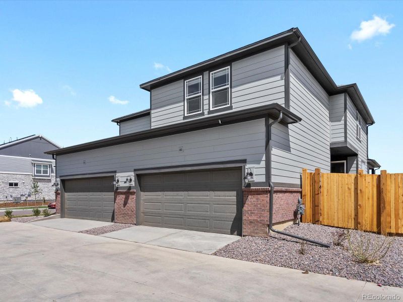 Front exterior of a new home in , Aurora, CO, highlighting curb appeal (Image 1). Front exterior of a new home in , Aurora, CO, highlighting curb appeal (Image 1).