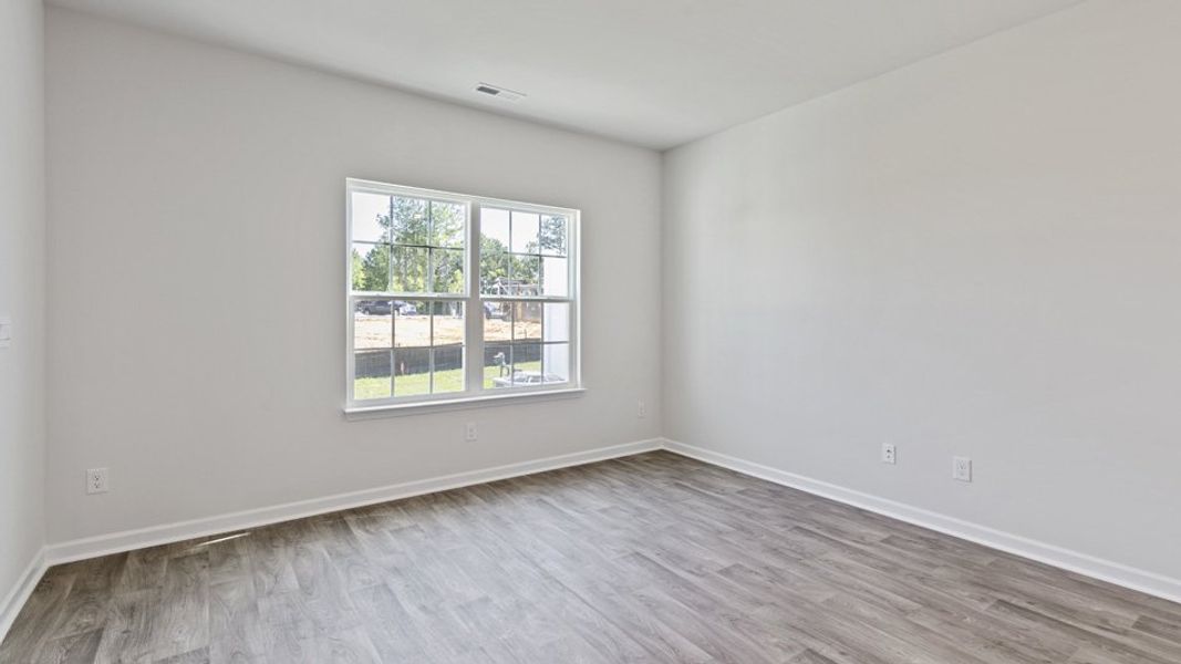 Spacious, unfurnished interior of a new home in The Townes at Wilson's Ridge, Smithfield (Image 15).