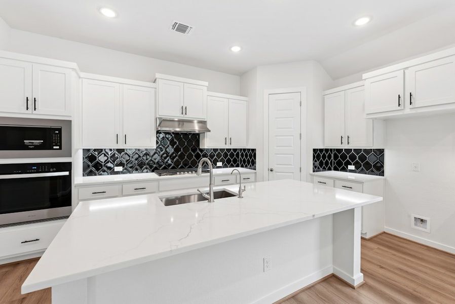 Furnished interior view inside a new home in University Heights, Round Rock (Image 7).
