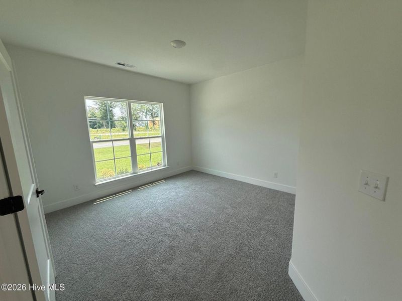 Spacious, unfurnished interior of a new home in Wood Creek Landing, Leland (Image 19). Spacious, unfurnished interior of a new home in Wood Creek Landing, Leland (Image 19).
