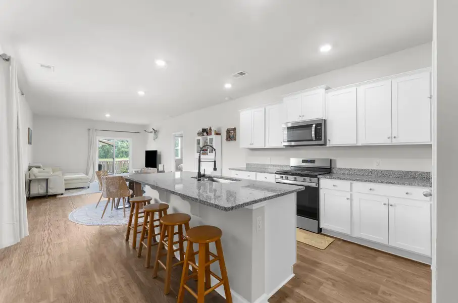 Furnished interior view inside a new home in Pine Hills at Cane Bay, Summerville (Image 34).