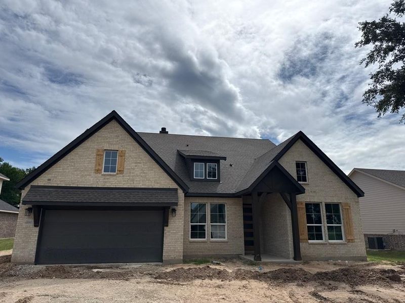 In-progress construction of a new home in Covenant Springs, Springtown, TX (Image 6).