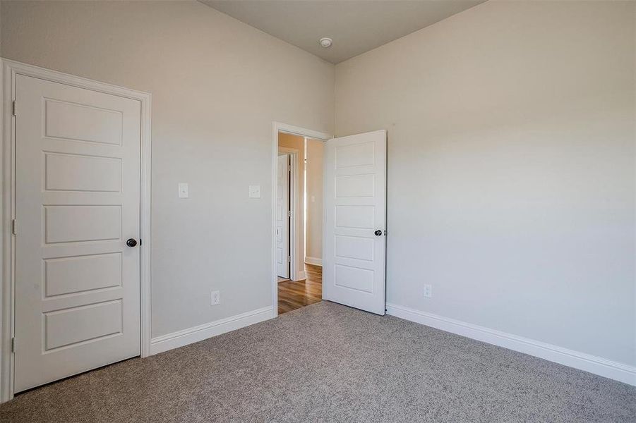 View of carpeted spare room