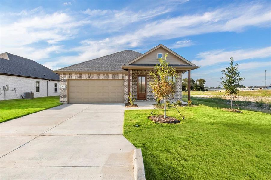 Front exterior of a new home in , Italy, TX, highlighting curb appeal (Image 22).