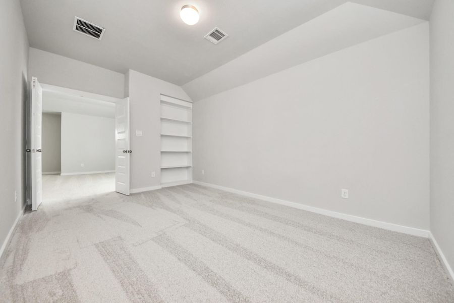 Discover this spacious media room, perfect for movie nights! Sample photo of completed home with similar floor plan. Actual colors and selections may vary.