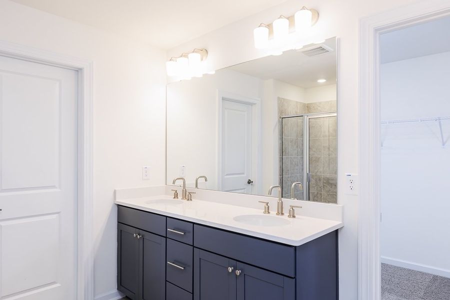 Representative furnished interior of a home built from the Ashford by Taylor Morrison in Young Farm, Apex (Image 16).