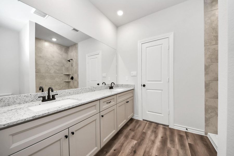 Furnished interior view inside a new home in The Enclave at Spring Branch, Montgomery (Image 17).