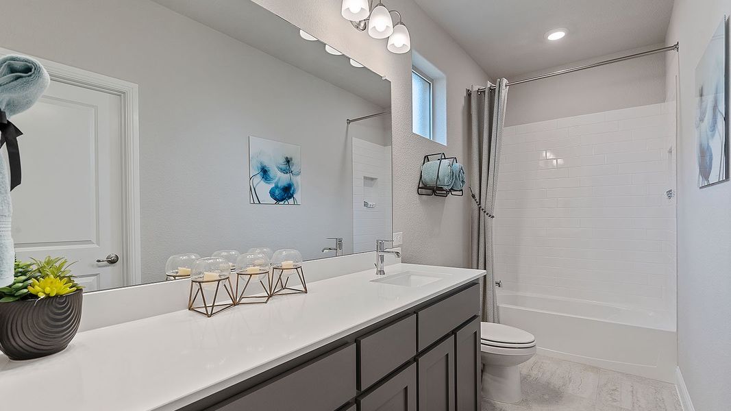 Representative furnished interior of a home built from the Guadalupe by D.R. Horton in Eden Ranch, Arlington (Image 31).