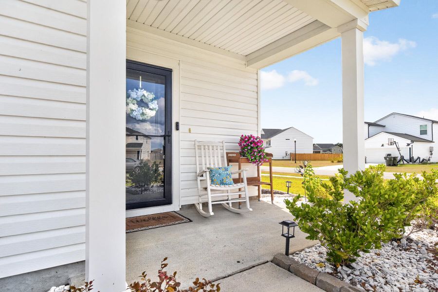 Exterior details and patio area of a home in Lindera Preserve at Cane Bay Plantation, Summerville (Image 4).