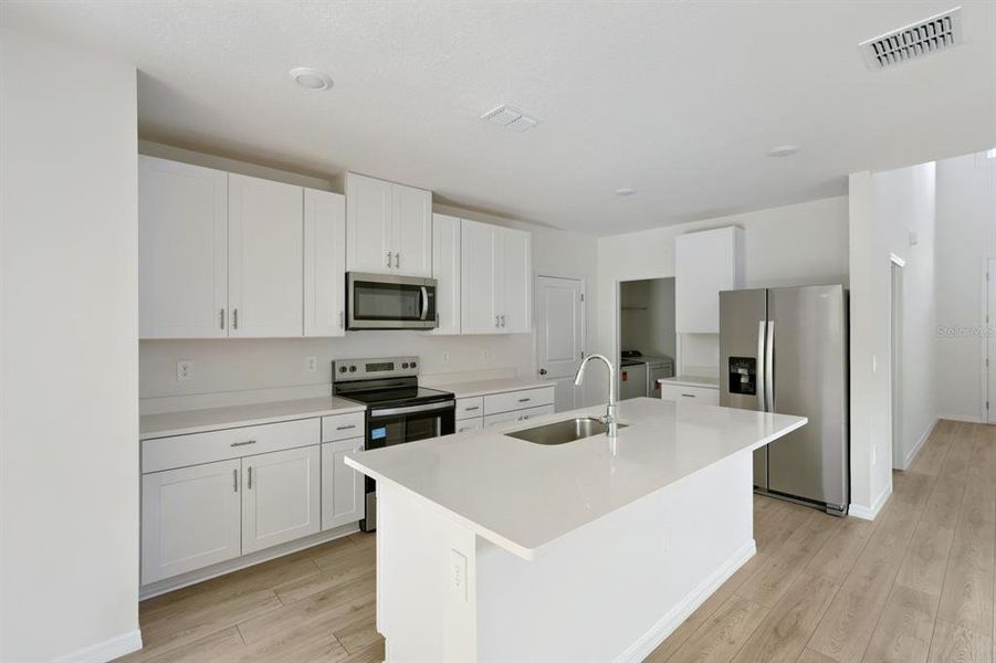 Furnished interior view inside a new home in Leyland Preserve - Premier Series, Brooksville (Image 8). Furnished interior view inside a new home in Leyland Preserve - Premier Series, Brooksville (Image 8).