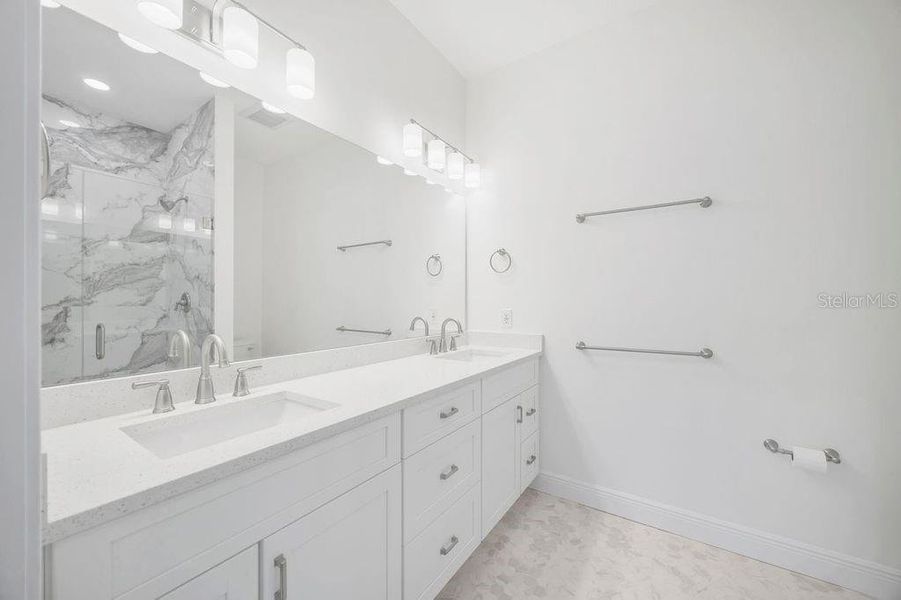 Master bathroom with dual sinks Master bathroom with dual sinks