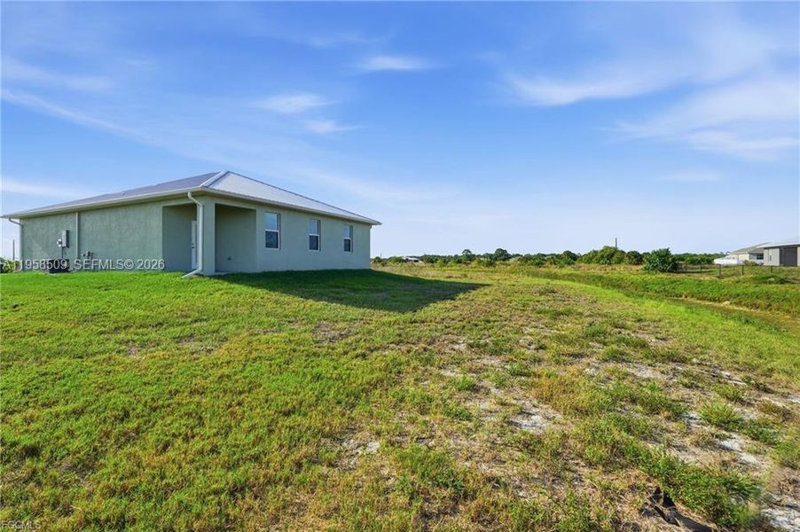 Exterior details and patio area of a home in , Labelle (Image 19).