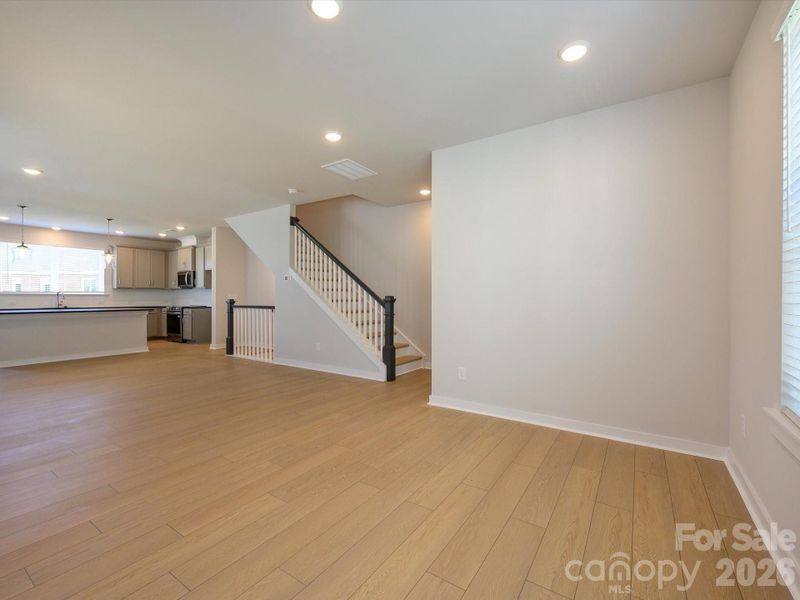 Spacious, unfurnished interior of a new home in Central Living at Craig, Charlotte (Image 22).