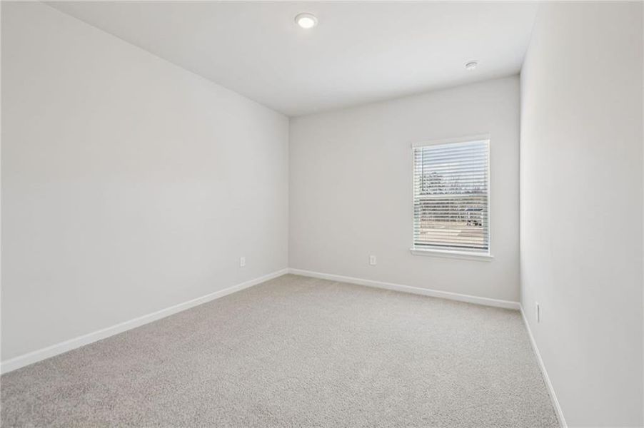 Spacious, unfurnished interior of a new home in Creekside at Oxford Park, Fairburn (Image 48).