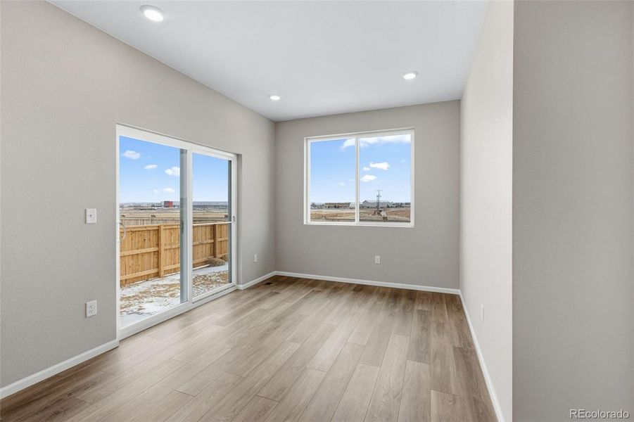Spacious, unfurnished interior of a new home in The Cottages Collection at Ridgeline Vista, Brighton (Image 19).