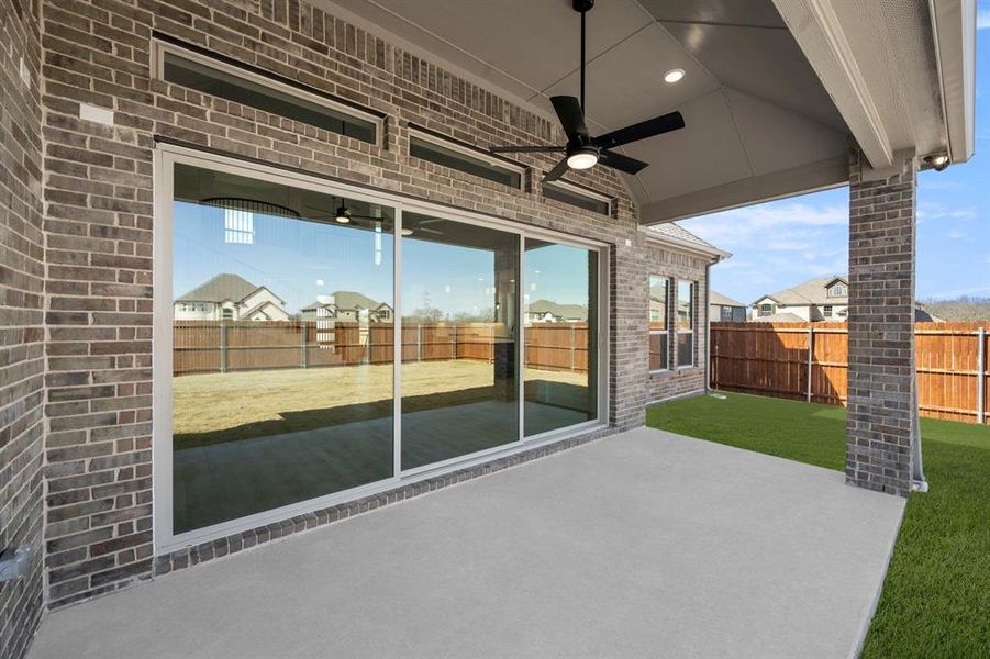 Exterior details and patio area of a home in High Country, Burleson (Image 20).