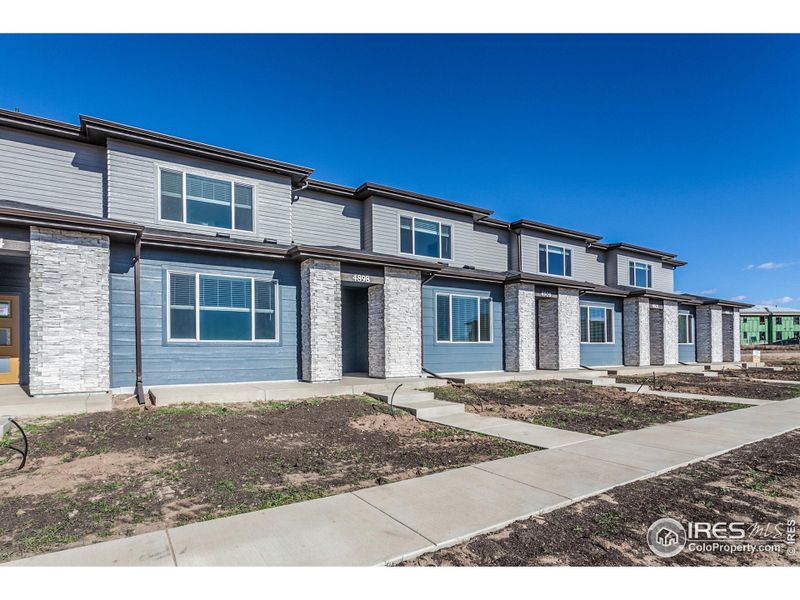 Exterior details and patio area of a home in , Timnath (Image 26).