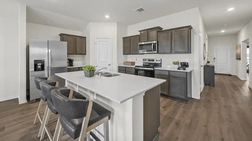 Furnished interior view inside a new home in Sanger Circle, Sanger (Image 2).