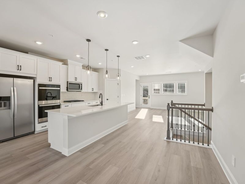Furnished interior view inside a new home in Hemingway - Highland Series, Cumming (Image 5).