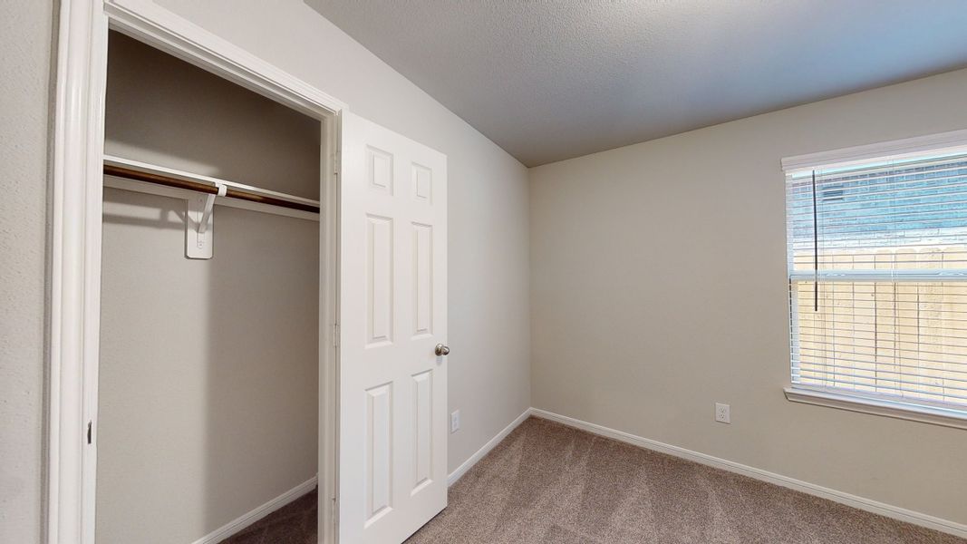 Representative unfurnished interior of a home built from the Floor Plan 1605 by Colina Homes in River Ranch, Dayton (Image 25).