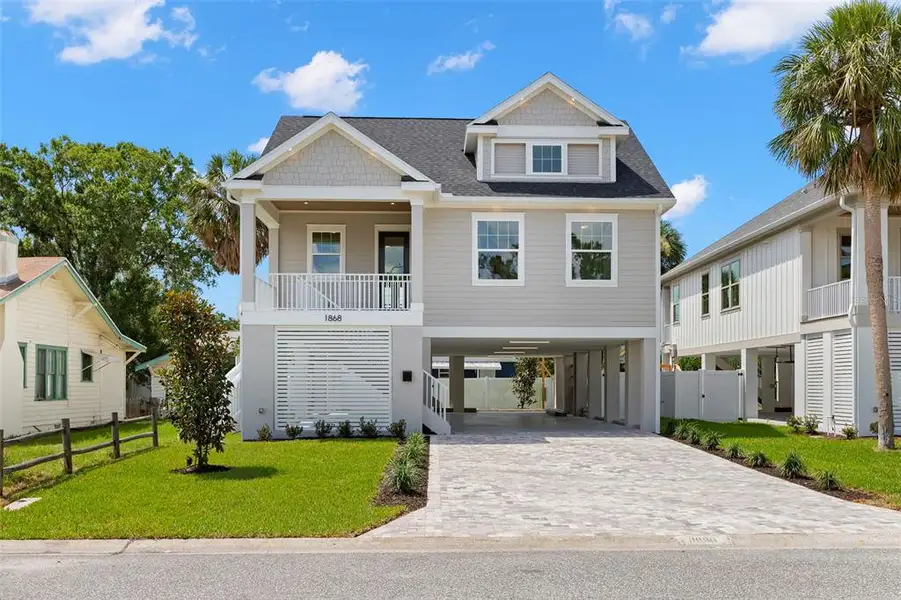 Front exterior of a new home in , St. Petersburg, FL, highlighting curb appeal (Image 24). Front exterior of a new home in , St. Petersburg, FL, highlighting curb appeal (Image 24).