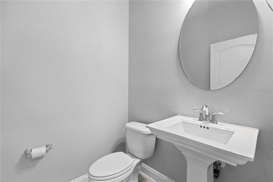 Furnished interior view inside a new home in Encore at Ovation, Winter Garden (Image 9).