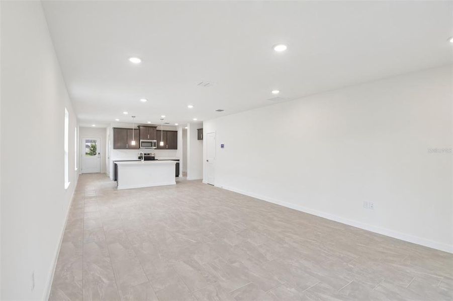 Spacious, unfurnished interior of a new home in Grasslands West, Lakeland (Image 22).