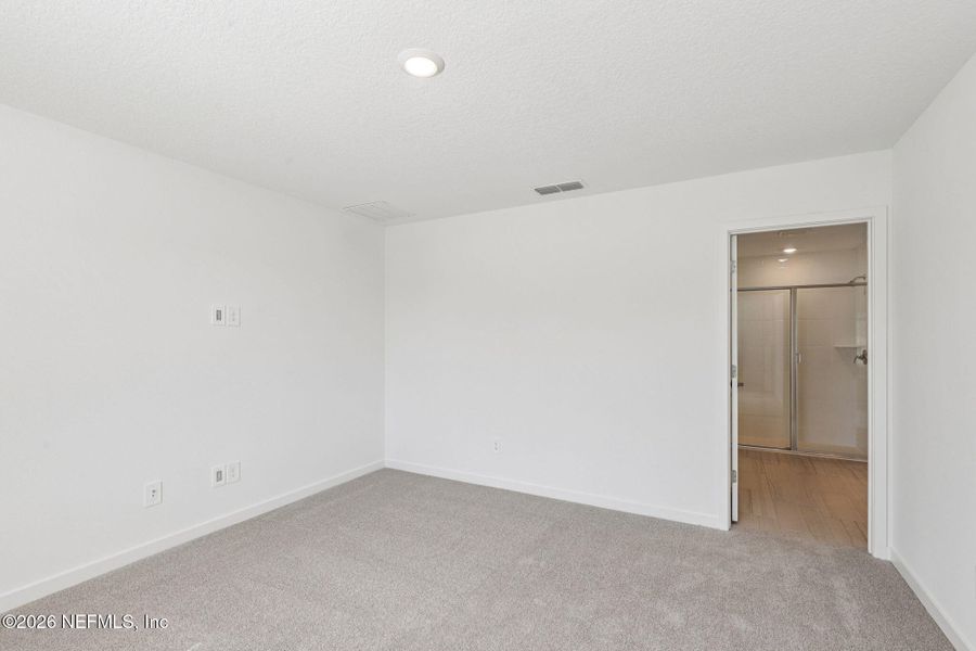 Spacious, unfurnished interior of a new home in Colbert Landings, Palm Coast (Image 29).