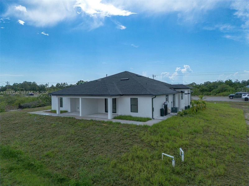 Exterior details and patio area of a home in , Lehigh Acres (Image 25).