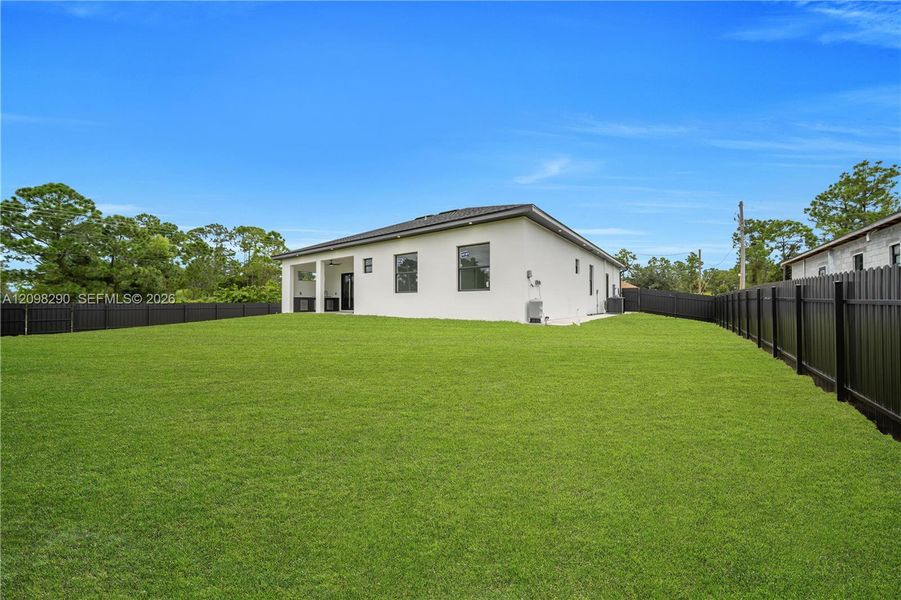 Exterior details and patio area of a home in , Lehigh Acres (Image 3).
